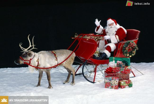 Hình tượng ông già Noel đi xe kéo tuần lộc tặng quà cho các em nhỏ